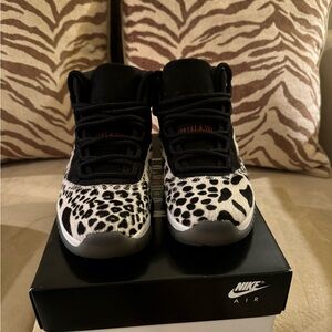 Nike Womens Air Jordan 11 Retro in Black/White Animal print.